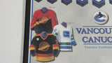 NHL Ice Hockey Vancouver Canucks Team Jersey and Arena History 10 3/4" x 13 1/4" Hardboard Wall Plaque