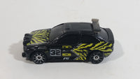 2004 Hot Wheels Tiki Torchers Ford Escort Rally #32 Black Die Cast Toy Car Vehicle