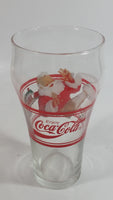 Enjoy Coca-Cola Santa Claus Holding a Bottle with Helicopter and Train Set Christmas Holiday Themed  6" Tall Glass Cup