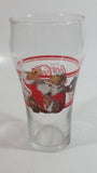 Enjoy Coca-Cola Santa Claus Holding a Bottle with Helicopter and Train Set Christmas Holiday Themed  6" Tall Glass Cup