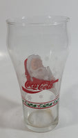 Enjoy Coca-Cola Santa Claus Holding a Bottle with Snowflakes and Holly Border Christmas Holiday Themed 6" Tall Glass Cup