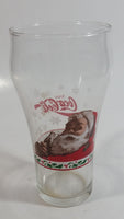 Enjoy Coca-Cola Santa Claus Holding a Bottle with Snowflakes and Holly Border Christmas Holiday Themed 6" Tall Glass Cup
