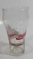 Enjoy Coca-Cola Santa Claus Holding a Bottle with Snowflakes and Holly Border Christmas Holiday Themed 6" Tall Glass Cup
