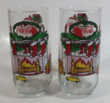 1980s McCrory Stores Inc Set of 2 Coca-Cola Santa Claus Fireplace with Stockings and Toys Christmas Holiday Themed 6" Tall Glass Cup