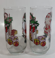 1980s McCrory Stores Inc Set of 2 Coca-Cola Santa Claus Fireplace with Stockings and Toys Christmas Holiday Themed 6" Tall Glass Cup