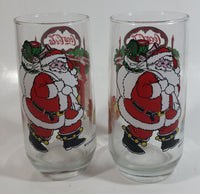 1980s McCrory Stores Inc Set of 2 Coca-Cola Santa Claus Fireplace with Stockings and Toys Christmas Holiday Themed 6" Tall Glass Cup