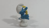 Vintage 1980 Peyo Smurf Character Holding and Eating French Fries PVC Toy Figure