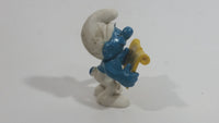 Vintage 1978 Peyo Smurf Character Singing and Holding Music Sheet PVC Toy Figure