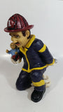 Fireman Firefighter Holding A Young Child Heavy Wine Bottle Holder Sculpture 9 1/2" Tall