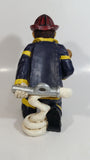 Fireman Firefighter Holding A Young Child Heavy Wine Bottle Holder Sculpture 9 1/2" Tall