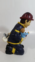 Fireman Firefighter Holding A Young Child Heavy Wine Bottle Holder Sculpture 9 1/2" Tall