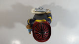 Fireman Firefighter Holding A Young Child Heavy Wine Bottle Holder Sculpture 9 1/2" Tall