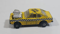 Vintage 1973 Lesney Matchbox Rolamatics No. 72 Maxi Taxi Yellow Cab Die Cast Toy Car Vehicle Made in Hong Kong