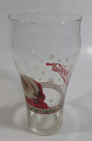 Enjoy Coca-Cola Santa Claus Holding a Bottle with Snowflakes and Holly Border Christmas Holiday Themed 6" Tall Glass Cup