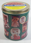 1995 Coca-Cola Coke Soda Pop Drink Beverage "World of Coke" Coke Girls with Flowers Green Round Tin Metal Canister Collectible with Carriage Trade Mini Twist Pretzel Sticker Still On The Lid