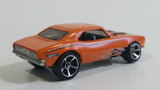 2010 Hot Wheels 1967 Chevrolet Camaro Orange Die Cast Toy Car Vehicle w/ Opening Hood