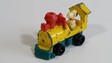 Vintage Aviva 1950, 1959, 1966 No. C17 Snoopy Locomotvie Train Engine Yellow Teal Red Die Cast Toy Car Vehicle Made in Hong Kong Peanuts Comic Strip Cartoon Collectible