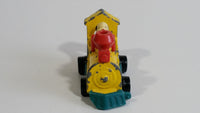 Vintage Aviva 1950, 1959, 1966 No. C17 Snoopy Locomotvie Train Engine Yellow Teal Red Die Cast Toy Car Vehicle Made in Hong Kong Peanuts Comic Strip Cartoon Collectible