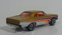 2010 Hot Wheels Nightburnerz '70 Roadrunner Metalflake Gold Die Cast Toy Muscle Car Vehicle