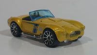 2012 Hot Wheels Shelby Classic Cobra Convertible Metalflake Light Gold Die Cast Toy Car Vehicle w/ Opening Hood