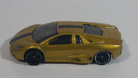 2013 Hot Wheels World Race Lamborghini Reventon Metalflake Gold Die Cast Toy Car Vehicle