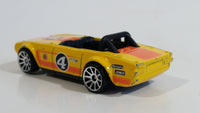 2011 Hot Wheels Track Stars Triumph TR6 Yellow #4 Die Cast Toy Race Car Vehicle