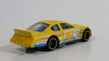 2011 Hot Wheels Dodge Charger Stock Car Yellow #82 Holst Wheels Die Cast Toy Car Vehicle