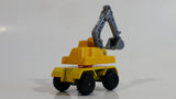 1997 M.M.T.L. Excavator Yellow Die Cast Toy Car Construction Vehicle