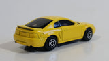 Maisto 1999 Ford Mustang Yellow Die Cast Toy Car Vehicle 1/64 Scale