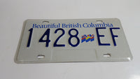 Beautiful British Columbia White with Blue Letters Vehicle License Plate 1428 EF