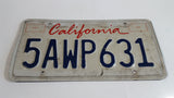 1996-97 California in Red on White with Blue Letters Vehicle License Plate 5AWP631