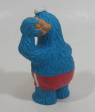 Applause Muppets Sesame Street Cookie Monster Character In Beach Shorts with a Pail of Shells Holding a Conch Shell To His Ear 3" Tall Hard Rubber PVC Toy