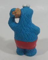 Applause Muppets Sesame Street Cookie Monster Character In Beach Shorts with a Pail of Shells Holding a Conch Shell To His Ear 3" Tall Hard Rubber PVC Toy