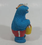 Applause Muppets Sesame Street Cookie Monster Character In Beach Shorts with a Pail of Shells Holding a Conch Shell To His Ear 3" Tall Hard Rubber PVC Toy