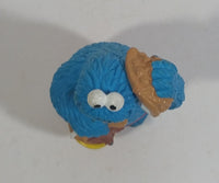 Applause Muppets Sesame Street Cookie Monster Character In Beach Shorts with a Pail of Shells Holding a Conch Shell To His Ear 3" Tall Hard Rubber PVC Toy