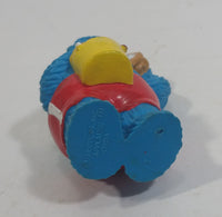 Applause Muppets Sesame Street Cookie Monster Character In Beach Shorts with a Pail of Shells Holding a Conch Shell To His Ear 3" Tall Hard Rubber PVC Toy