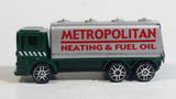 Maisto Special Edition Gas Tanker Metropolitan Heating & Fuel Oil Truck Dark Green and Silver Die Cast Toy Car Vehicle