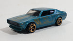 2014 Hot Wheels Night Burnerz Nissan Skyline H/T 2000GT-R Teal Die Cast Toy Car Vehicle