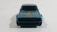 2014 Hot Wheels Night Burnerz Nissan Skyline H/T 2000GT-R Teal Die Cast Toy Car Vehicle