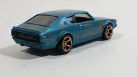 2014 Hot Wheels Night Burnerz Nissan Skyline H/T 2000GT-R Teal Die Cast Toy Car Vehicle