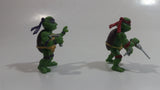 Lot of 2 2014 Ninja Turtles Donatello and Raphael Characters 1" Tall Mini Toy Action Figures