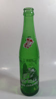 Vintage 1960s Mountain Dew Filled By Jim and Clara "Hillbilly Style" Green Glass Soda Pop Beverage Bottle "It'll tickle your innards!"