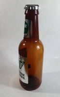 CFL Saskatchewan Roughriders Football Team Plastic 14" Tall Brown Beer Bottle Shaped Coin Bank