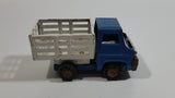 Vintage 1960s Louis Marx Blue and White Stake Bed Dumping Farm Truck Pressed Steel Toy Car Vehicle