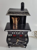 Vintage Spartus Antique Style Black Pot Belly Stove Shaped Electric Plugin Clock