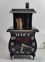 Vintage Spartus Antique Style Black Pot Belly Stove Shaped Electric Plugin Clock