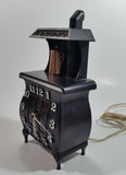 Vintage Spartus Antique Style Black Pot Belly Stove Shaped Electric Plugin Clock