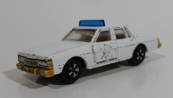 Vintage Warner Bro. ERTL Dukes of Hazzard 1980 Pontiac Bonneville Sheriff Police Cop White Die Cast Toy Car Vehicle TV Show Collectible Blue Lights