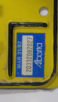 Vintage 1980s Alberta Wild Rose Country Yellow with Black Letters Passenger Vehicle Metal License Plate Tag VXT - 776