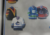 NHL Ice Hockey Vancouver Canucks Team Jersey and Arena History 10 3/4" x 13 1/4" Hardboard Wall Plaque